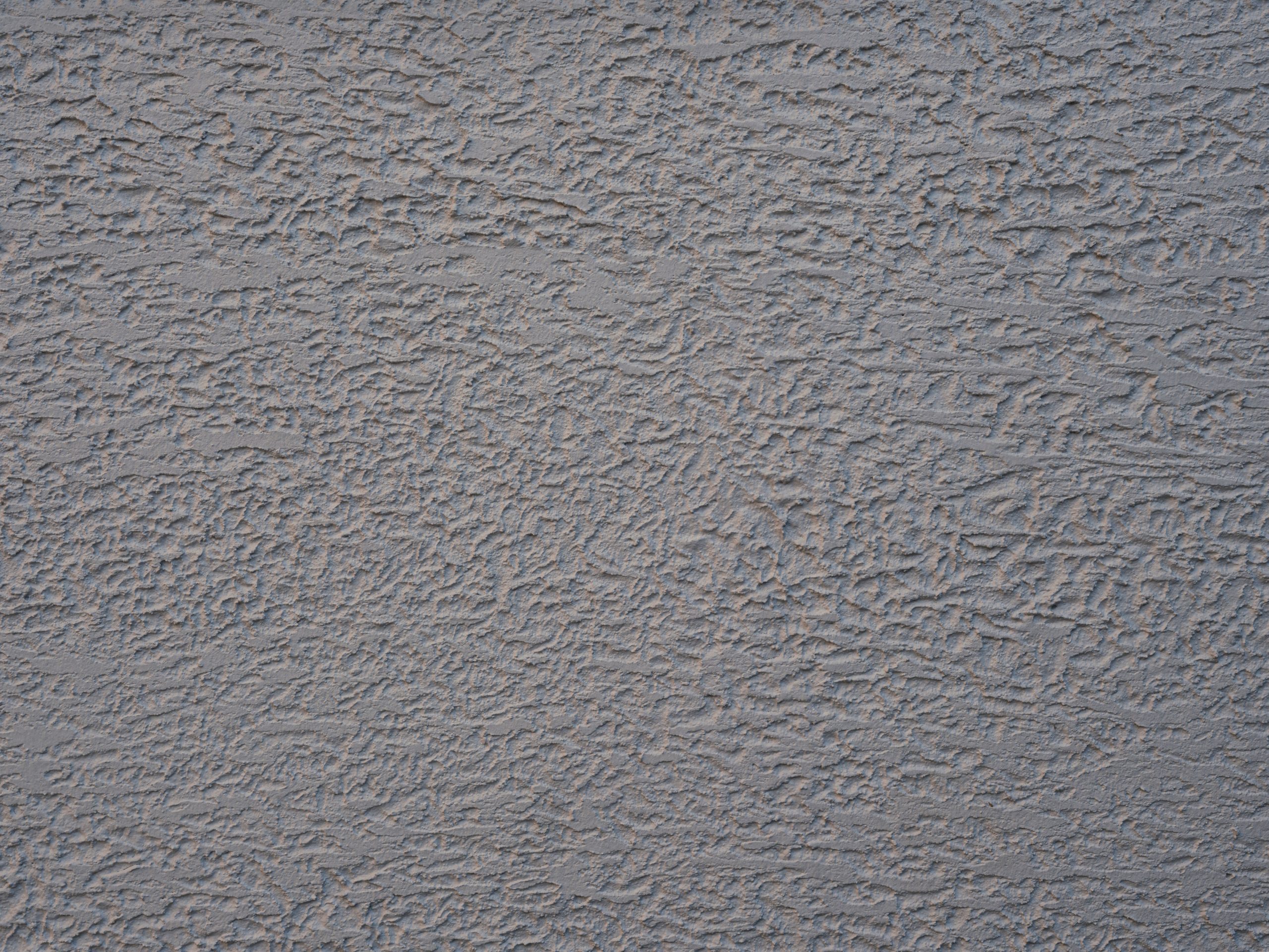 Détails texture grise mur enduit plâtre