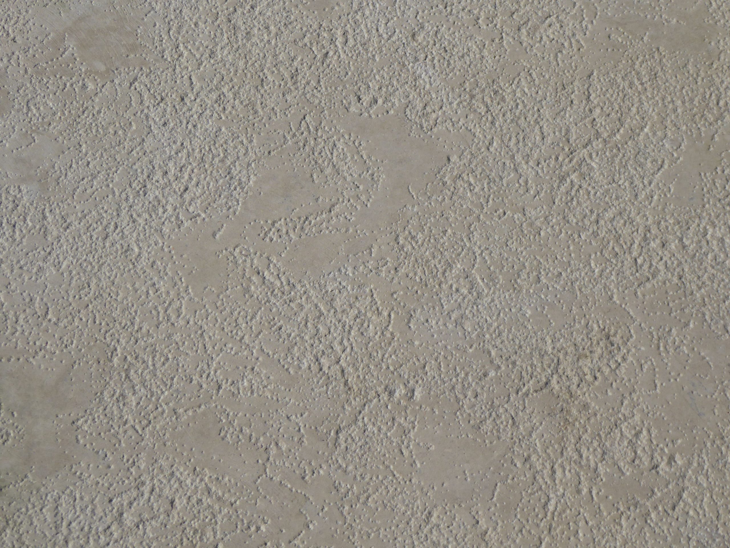 Surface béton beige texturée panneau construction
